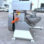 side view of potato masher machine